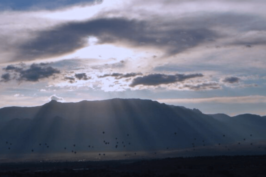 Albuquerque Balloon fiesta at sunrise with Sandia Peak