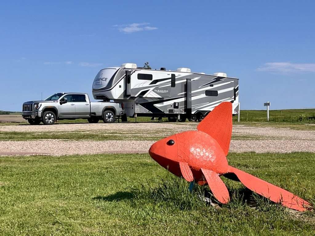 Road trip along South Dakota's I-90 in a GMC 3500 Denali and Alliance 340RL Paradigm at Porter Sculpture Garden 