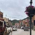 Street in Deadwood South Dakota with horse drawn carriage