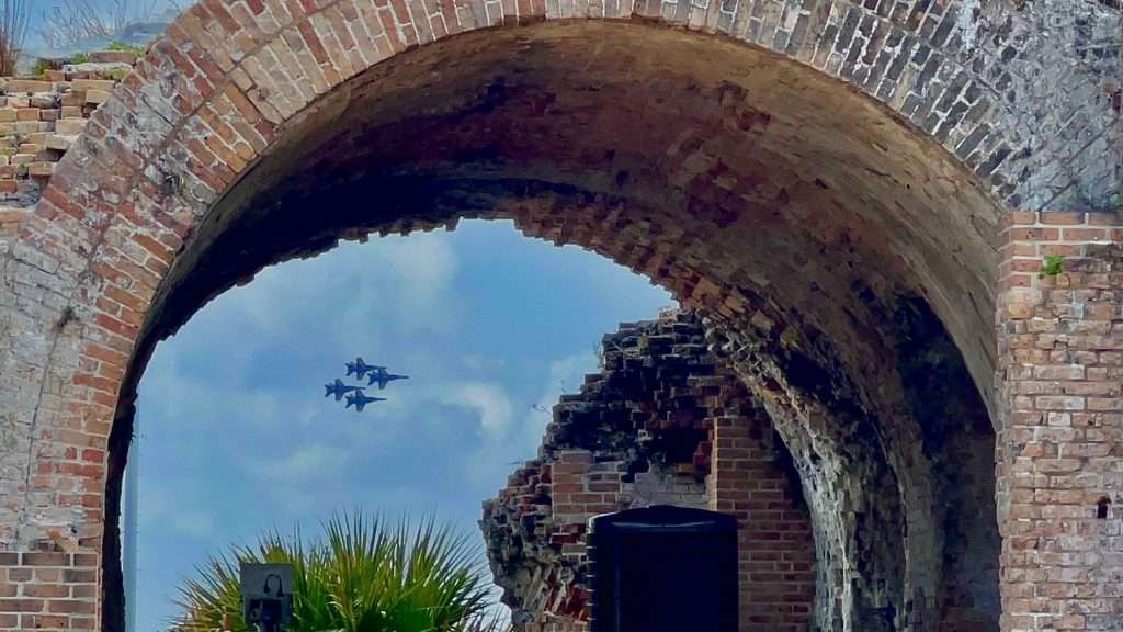 Blue Angels practice flight caught through the archway at Fort Pickens near Pensacola Florida 